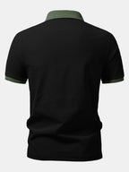 Musta pikeepaita kontrastisilla raglan-hihoilla takaa