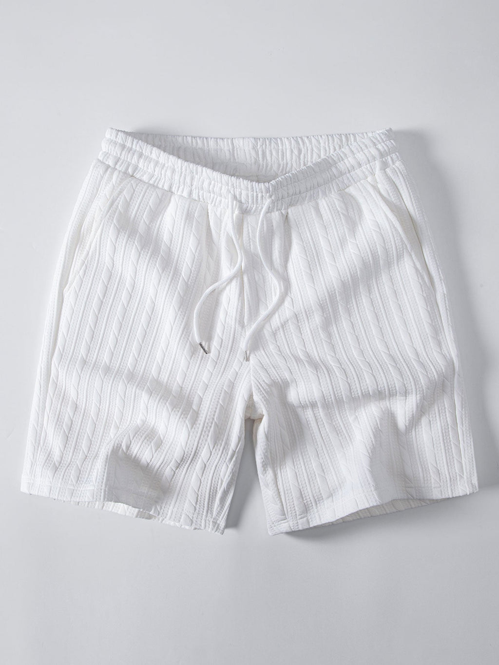 White cable-jacquard drawstring shorts, front product view