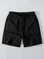 Black cable-jacquard drawstring shorts, front product view