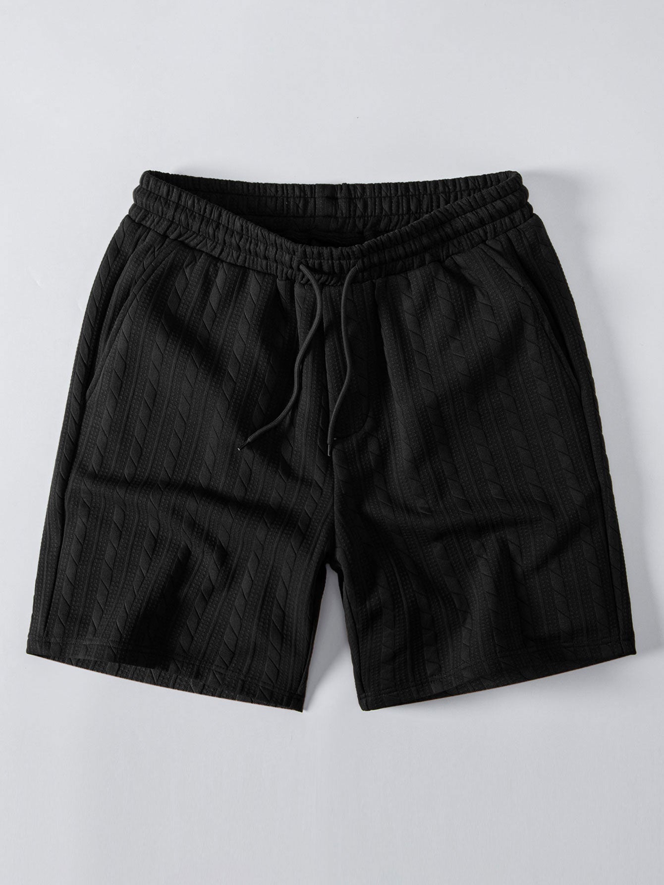 Black cable-jacquard drawstring shorts, front product view