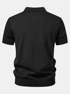 Musta geometrinen jacquard-neulepikeepaita takaa