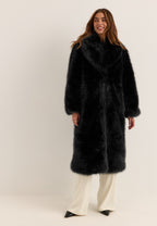 Musta, pitkä tekoturkistakki