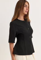 Musta nappipusero, peplum-muoto