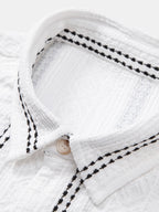 Setti: geometrinen jacquard-nappipaita ja kreppipintaiset shortsit