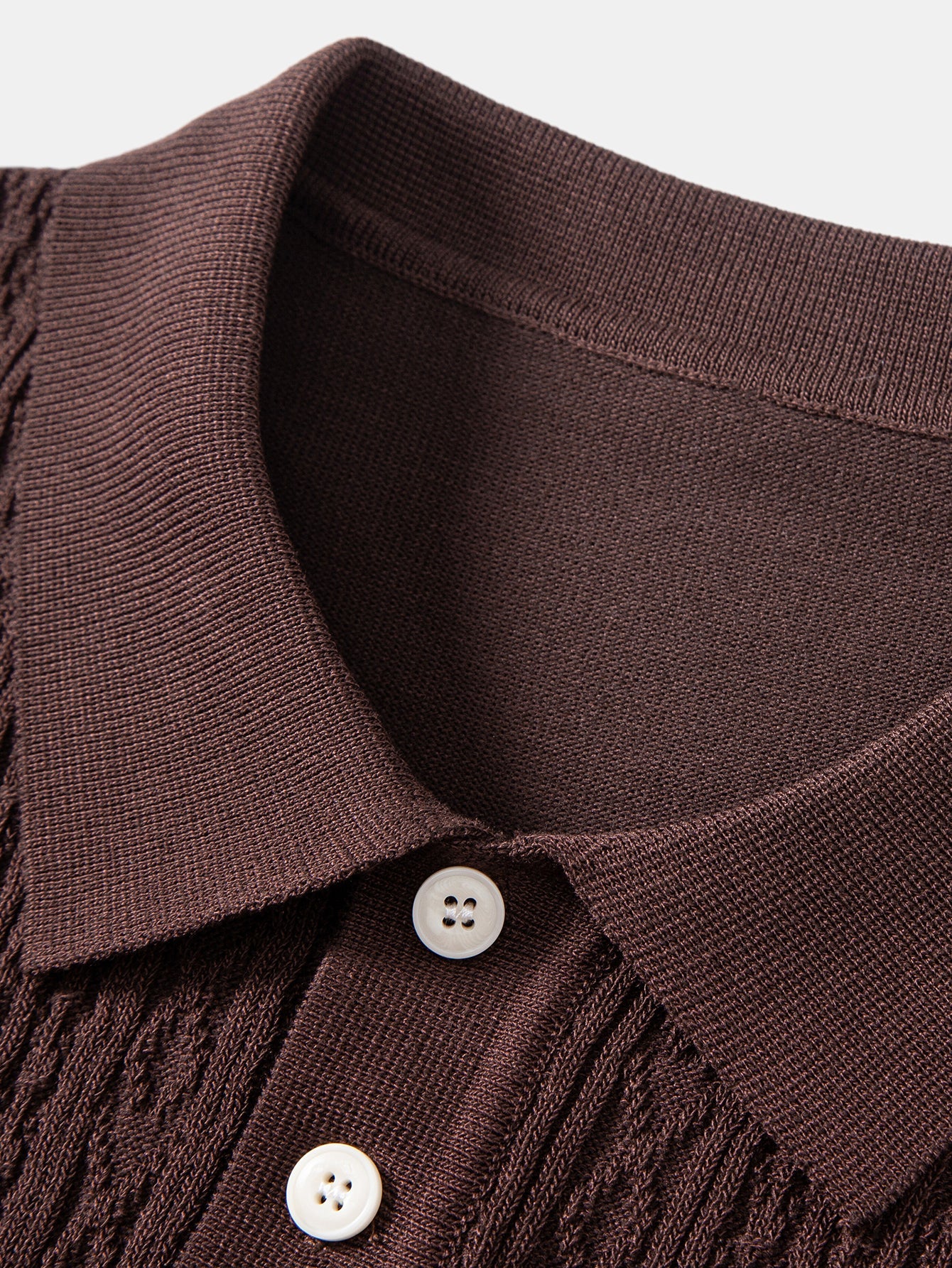 Geometrinen jacquard-neulepikeepaita