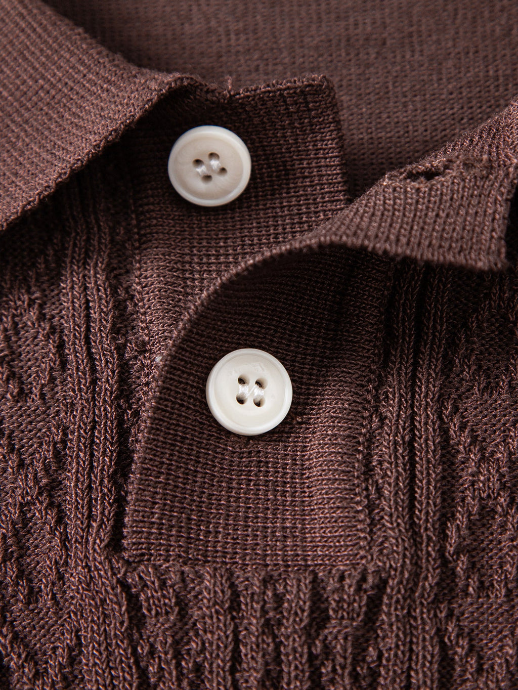 Geometrinen jacquard-neulepikeepaita