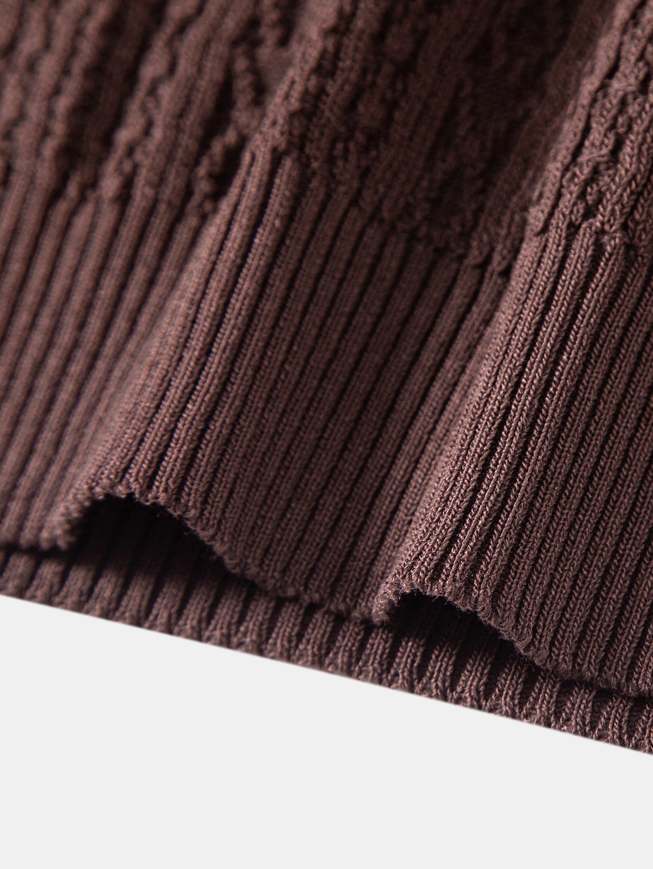 Geometrinen jacquard-neulepikeepaita