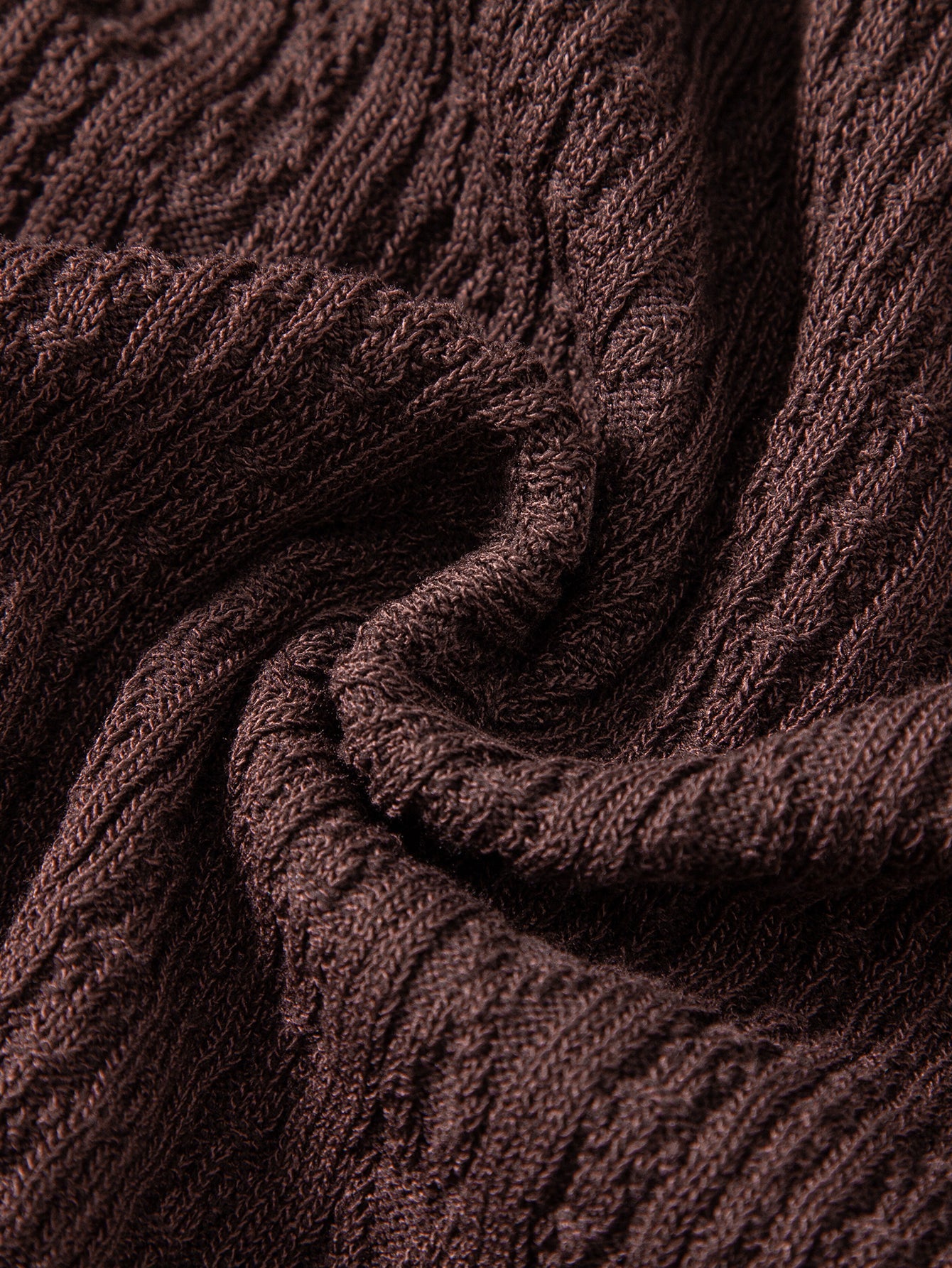 Geometrinen jacquard-neulepikeepaita