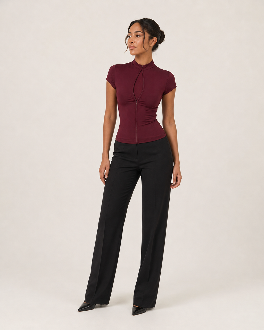 Ava wine-burgundy short-sleeve keyhole zip-front top, three-quarter full-body catalog view