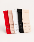 Conjunto de cinco extensores de soutien em vermelho, rosa, branco, preto e bege sobre fundo off-white