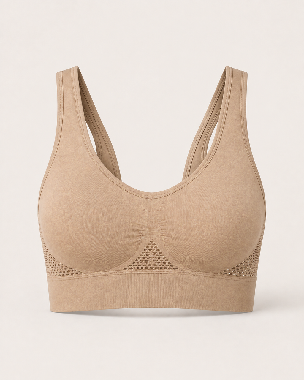 Breathable seamless sports bra in beige, product-only studio view