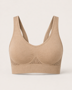Breathable seamless sports bra in beige, product-only studio view