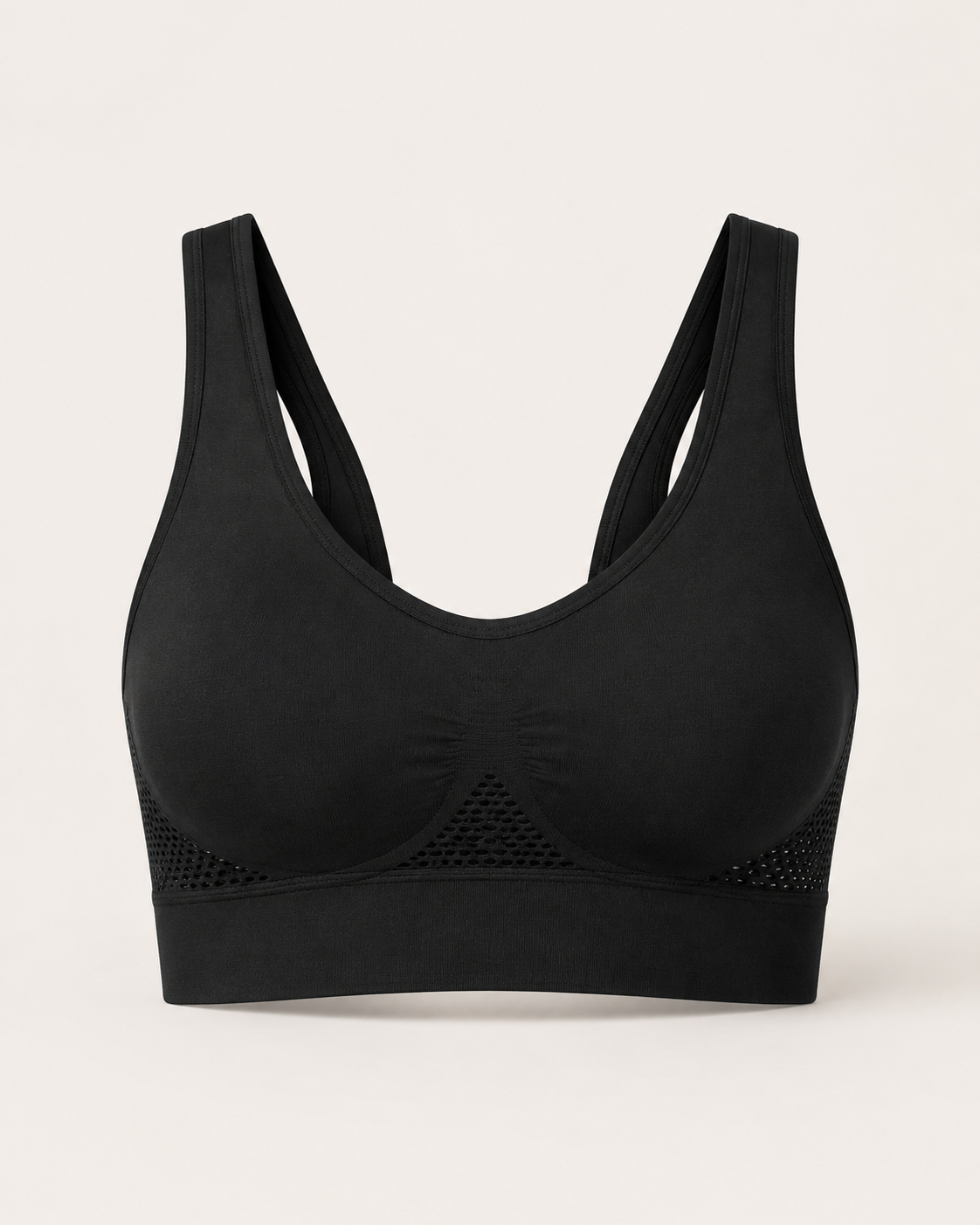 Breathable seamless sports bra in black, product-only studio view