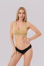 Model wearing the breathable seamless sports bra in beige