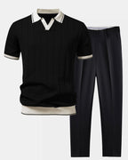Musta ribbikauluksinen pikeepaita ja kapenevat slim fit -housut 4:5-tuotekuvassa